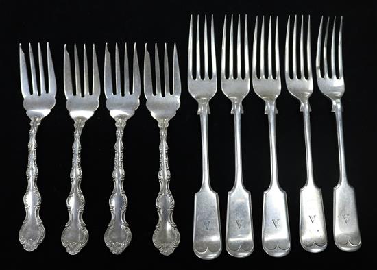 A set of four Canadian sterling silver cake forks by Birks and a set of five silver dessert forks by Mappin & Webb